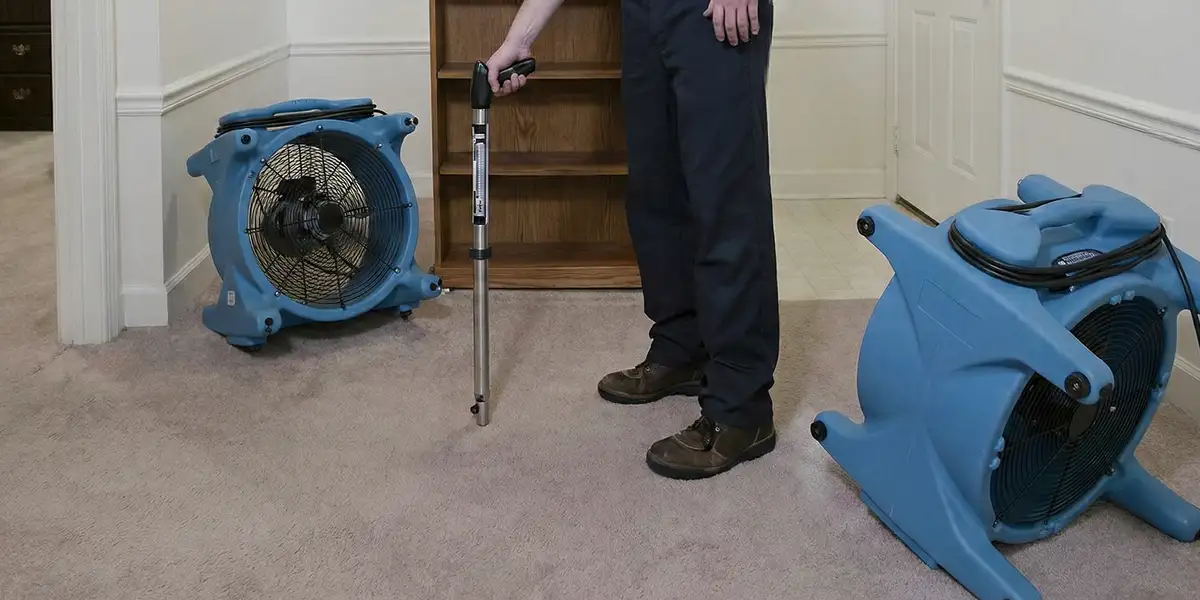 emergency water removal equipment deployed to dry a flooded residential interior in Wichita, KS